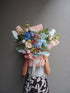 Brume luxury bouquet — two-tone blue hydrangea and pink tulip bouquet with dusty rose wrapping by Beyond Merci Singapore 