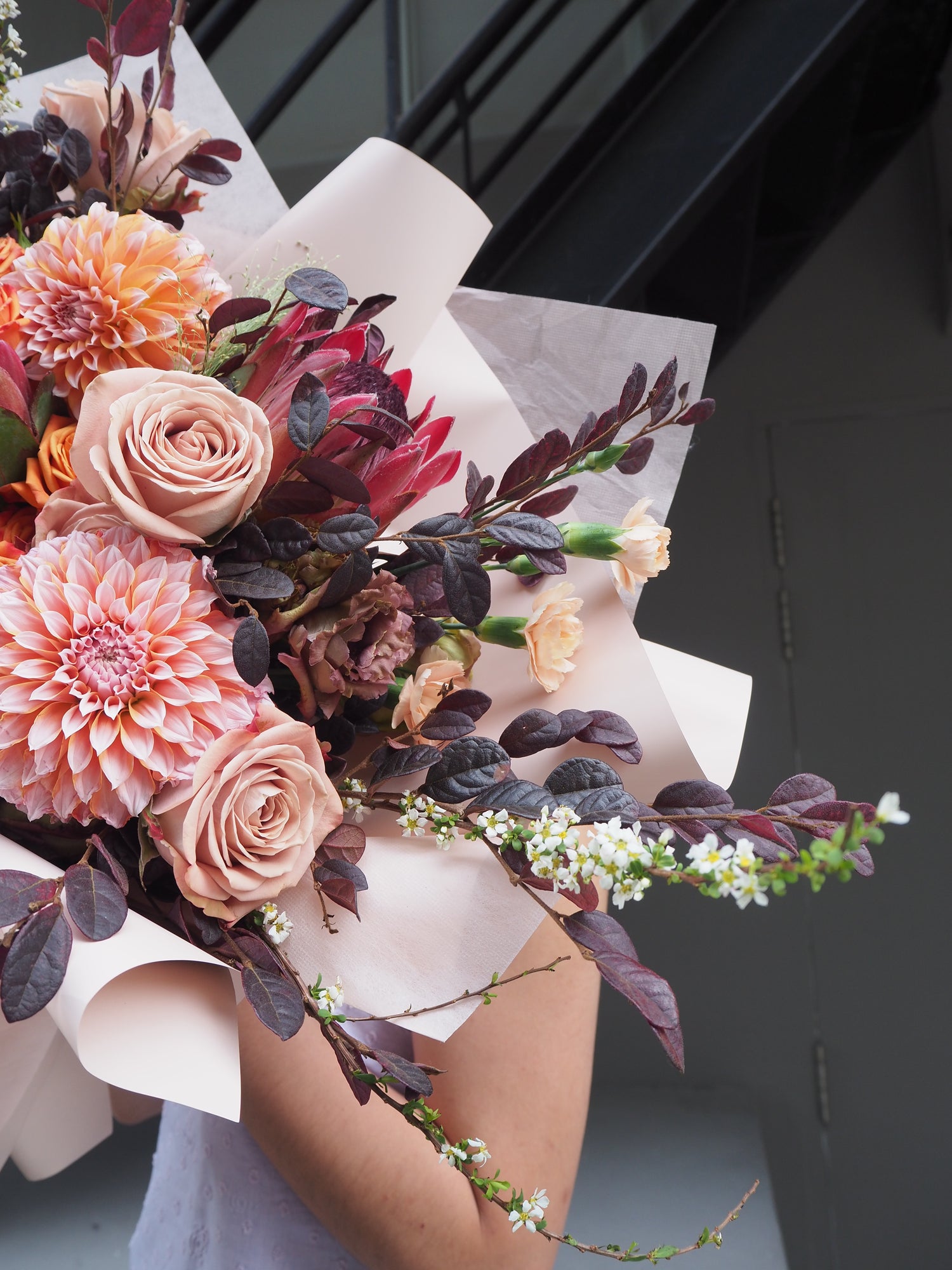 Luxury autumn fresh flower bouquet with protea and dahlia. 